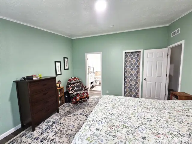 Primary bedroom looking toward bath.