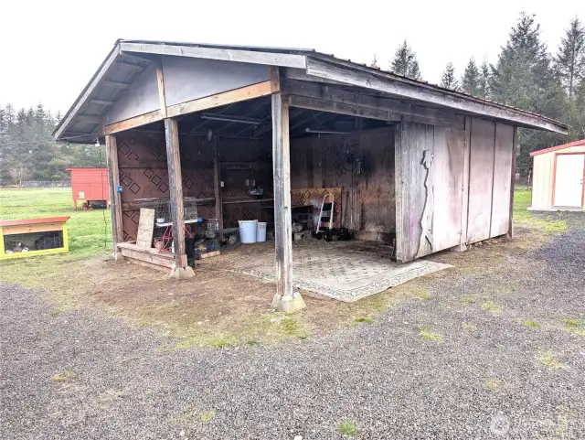 Carport with storage building