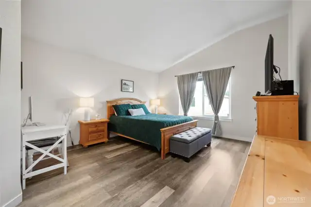 Sizeable Primary bedroom with attached bathroom, as well as walk-in-closet.
