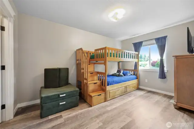 Bedroom #2, w/ walk in closet on left.