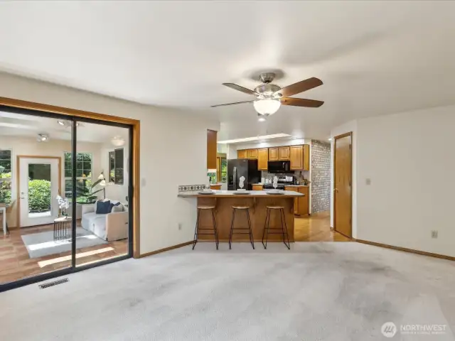 Family room opens to heated sunroom