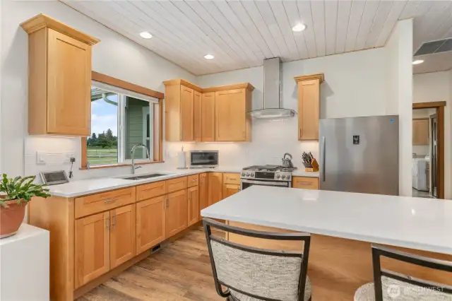 Equipped with quality stainless steel appliances, this kitchen blends style and function with a seamless, built-in look and modern convenience.