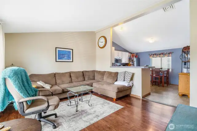 This spacious living room has room enough for the couches, a large TV and lots of good conversation.