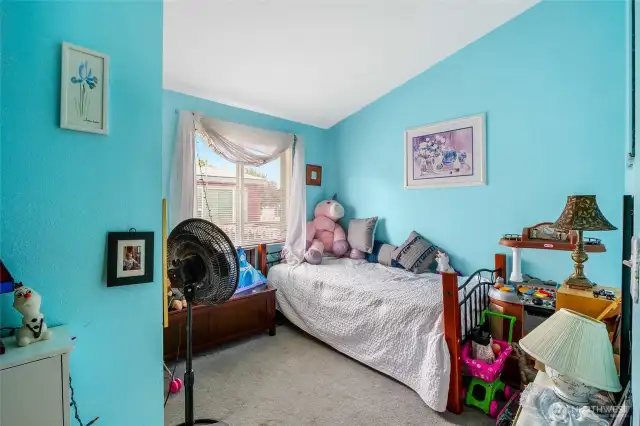 What a colorful bedroom!  This is bedroom #2.