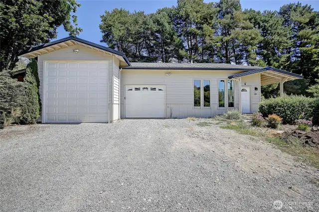 1052 sq ft home (ADU) 14 x 36 ft RV/Boat garage, single car garage + shop in the back.
