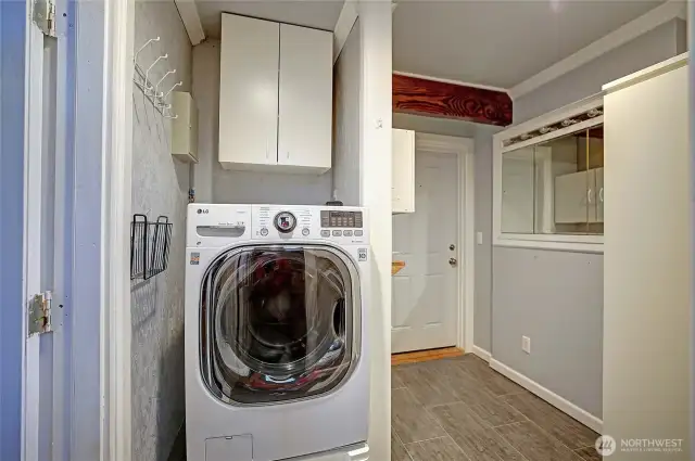 Combo washer/dryer & large utility room.