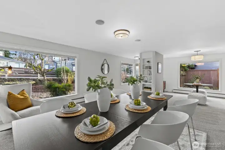 The same lovely front room staged as a dining room for your formal dining gatherings.