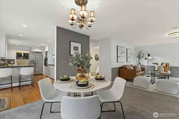 From living room to dining room and kitchen. Well defined areas with their own character that flow harmoniously together.