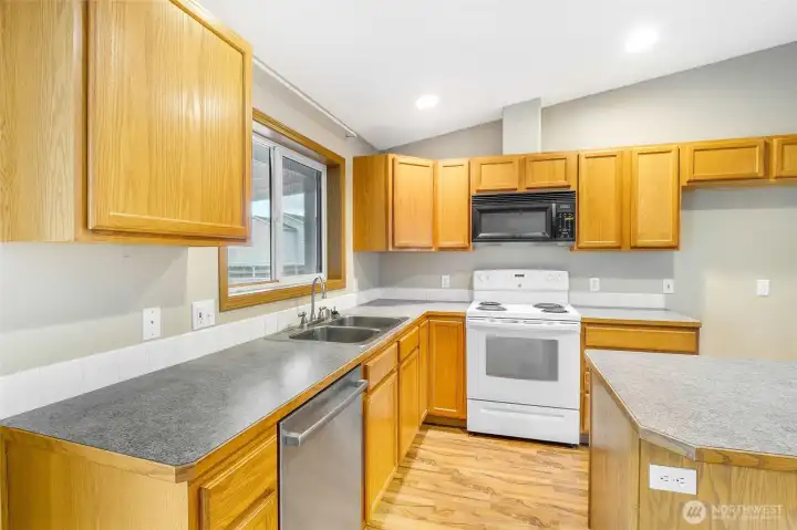 You have easy maintenance in this home with laminate countertops and vinyl w/wood flooring.