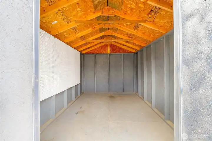 Interior of the shed, which includes a pegboard for you to organize all of your tools.