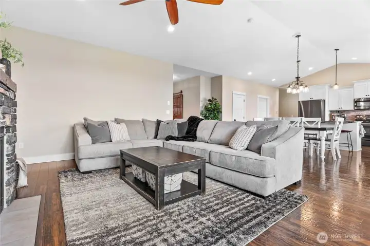 Main living area lends to great room feel w/vaulted ceilings, open & bright!