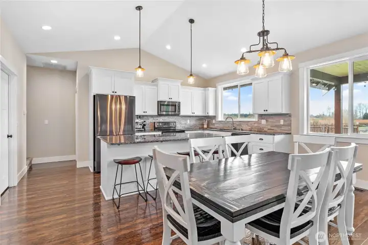 Owner's suite accessed just behind kitchen, tucked away from everything else