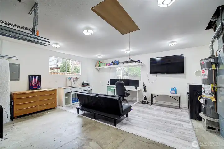 Finished garage offers multiple use options for parking, office, gaming or play space!