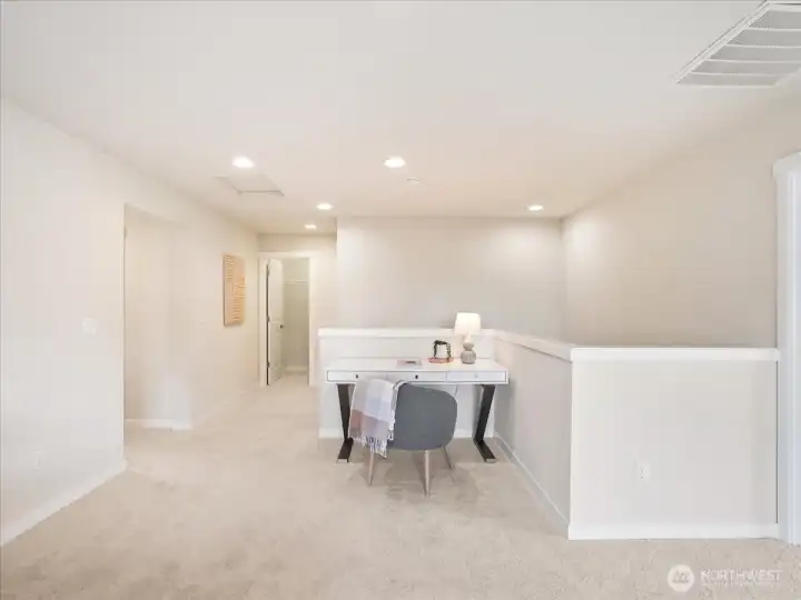 Flexible loft-style living space designed for productivity and comfort.