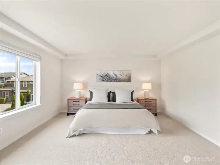 Luxurious primary retreat offering exceptional scale and refined comfort.