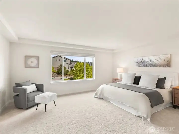 Large windows fill the room with beautiful natural light.