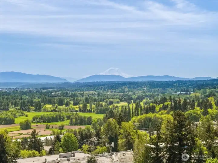 Panoramic mountain and valley views elevate the home’s exceptional setting.