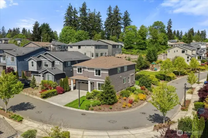 The low-maintenance yard creates a clean, polished outdoor space with room to relax or garden.
