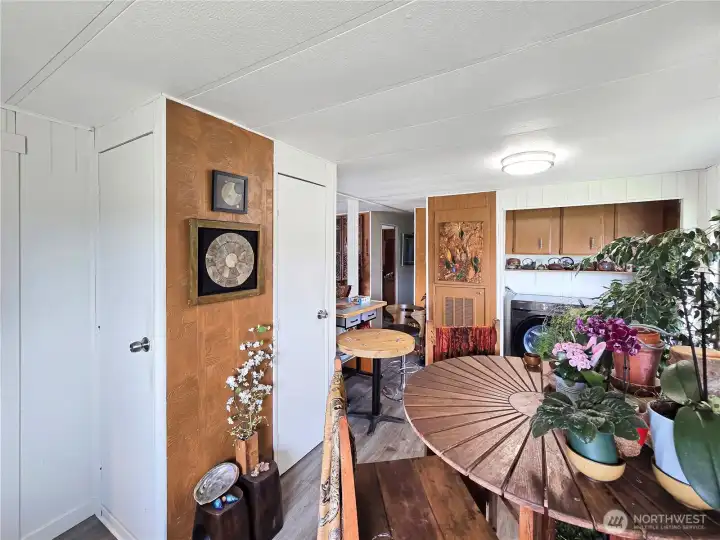 Dining area offers flexibility with space for a larger table and hosting guests.
