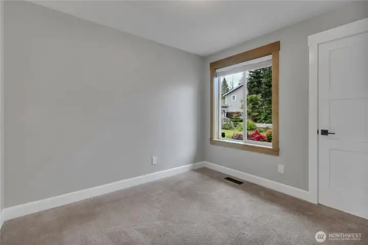 Main floor guest bedroom (4th) or Office/ Den Main floor guest bedroom (4th) or Office/ Den