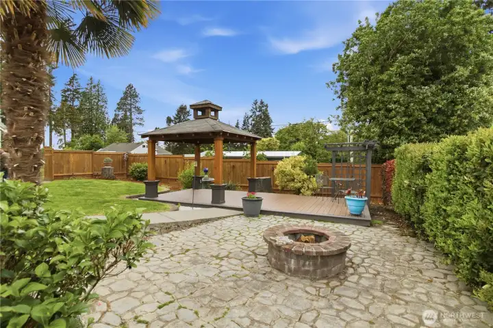 So much to enjoy here built-in fire pit, Gazebo great for out door cookout! So much to enjoy here built-in fire pit, Gazebo great for out door cookout!