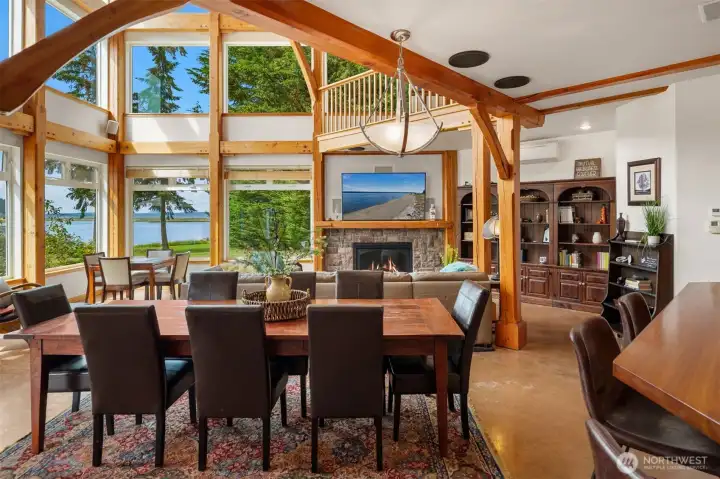 Radiant-heated concrete floors and a stunning gas fireplace create a warm, inviting atmosphere, making stormy days especially cozy. Radiant-heated concrete floors and a stunning gas fireplace create a warm, inviting atmosphere, making stormy days especially cozy.
