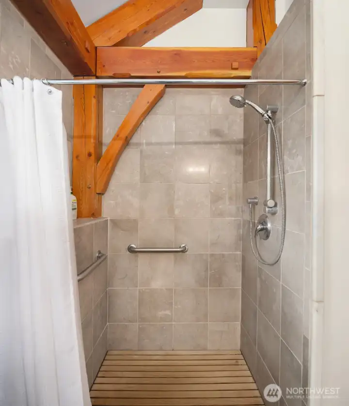 Even the showers are custom with beamed details. Even the showers are custom with beamed details.