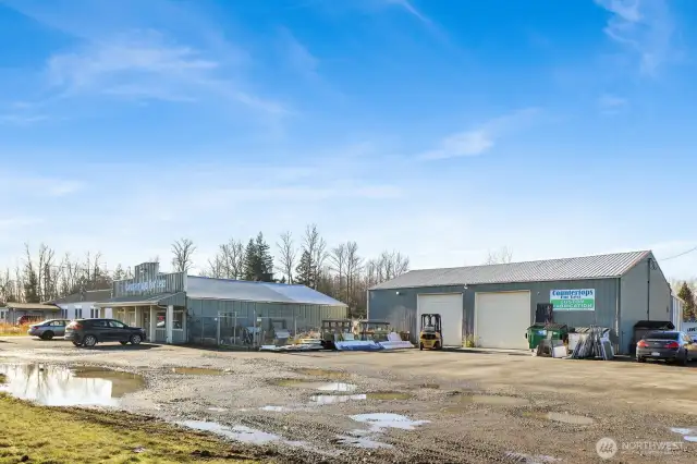 Next to the showroom is a large shop that has been used for countertop fabrication, but could be the perfect compliment to the showroom for whatever purpose is desired.