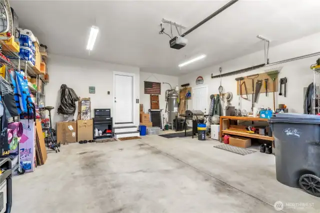Oversized 2 car garage with generator panel ready.