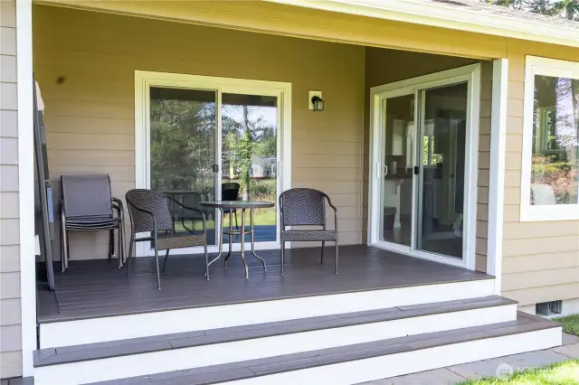 Covered back deck with composite decking.
