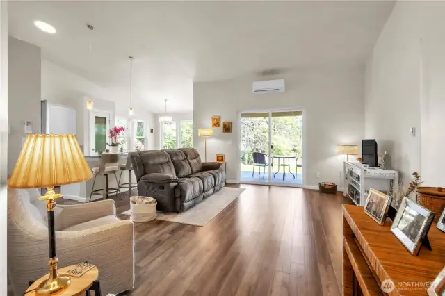Great room with vaulted ceilings and minisplit.