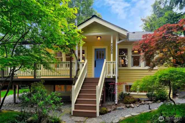 Welcome to Rose Cottage at 7505 32nd Ave SW. An iconic property with a thoughtfully curated secret garden.