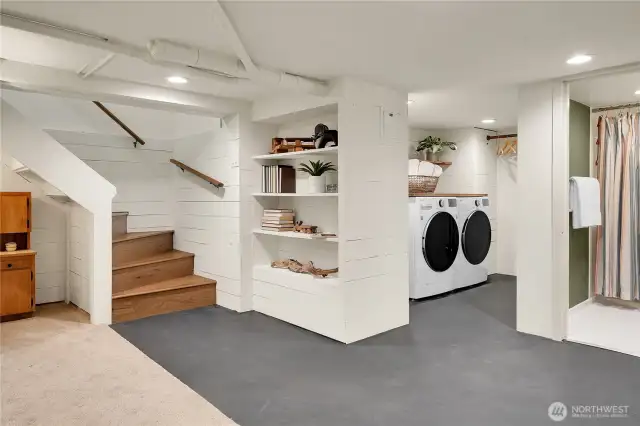 Mind the ceiling height downstairs. Despite it, the space is super comfortable and usable.