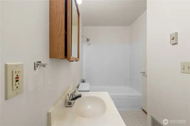 The full bathroom on the upper level of Unit A.