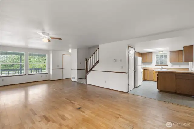 The open staircase leads to the upper level of Unit A.