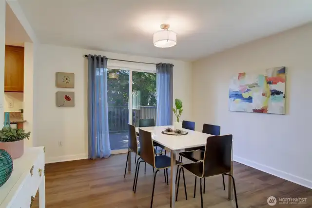Yes, the Dining room has easy entertaining flow to the deck outside!