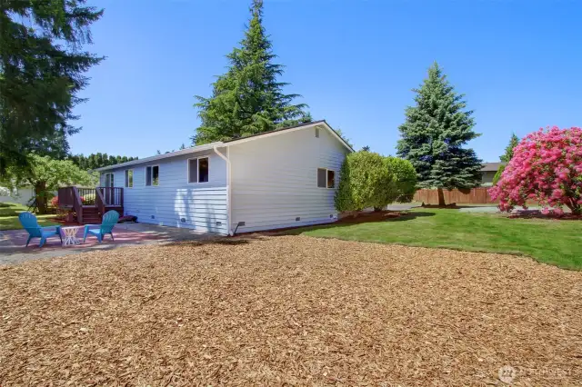 Standing to the SE of the home, this wood chip area used to have a playstructure (and could again!).