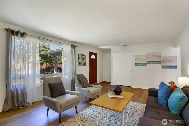 Fresh paint and new flooring throughout the home makes it--Move in Ready!