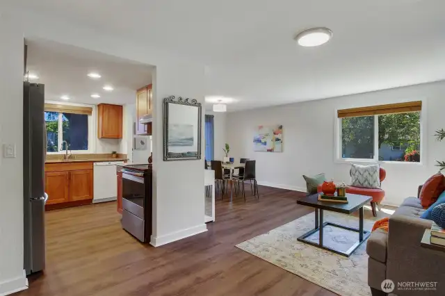 Kitchen and dining room are in an easy loop with the cozy hangout space. More casual than the living room, this space can be whatever your household needs! Study or office? TV and hobby area?