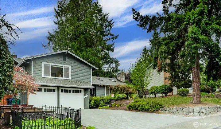 Beautiful park-like lot in sought after Tam O' Shanter Golf and Country Club.  Just painted exterior!