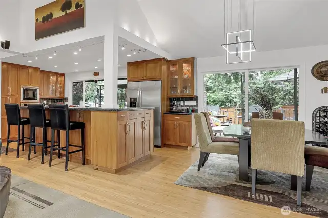 Cheerful kitchen/dining room with lots of lighting.