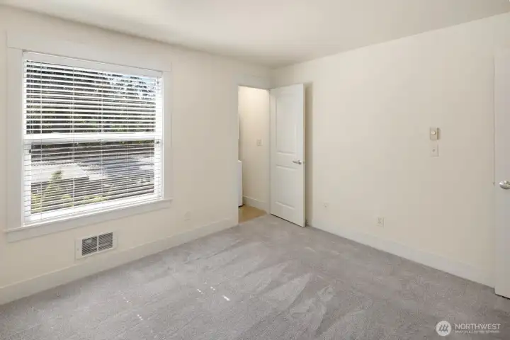 Bedroom with in-unit W/D