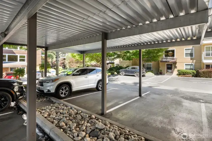 Parking space 163, the furthest spot to the right in photo, is just outside the main entrance to the building.