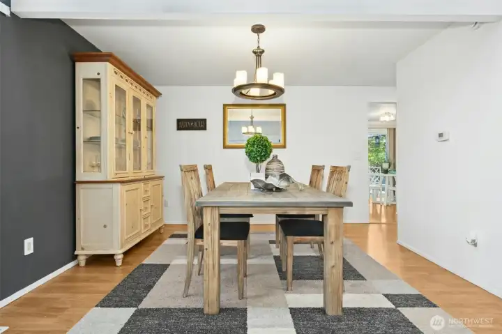 Warm dining area seamlessly connected to the kitchen and living spaces.