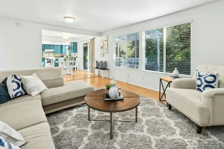 Large windows bring in peaceful backyard views.