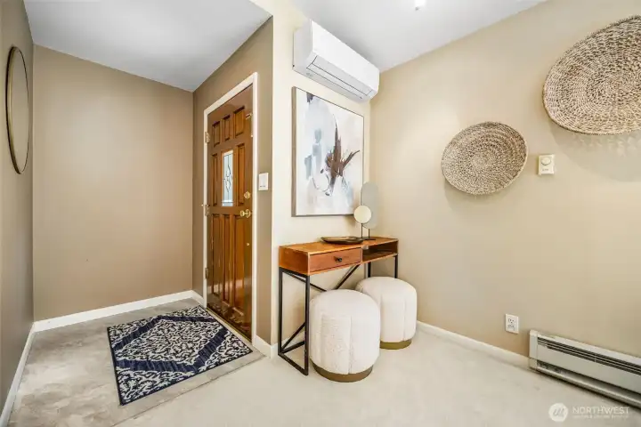 A true entry with space for armoire or other storage options.