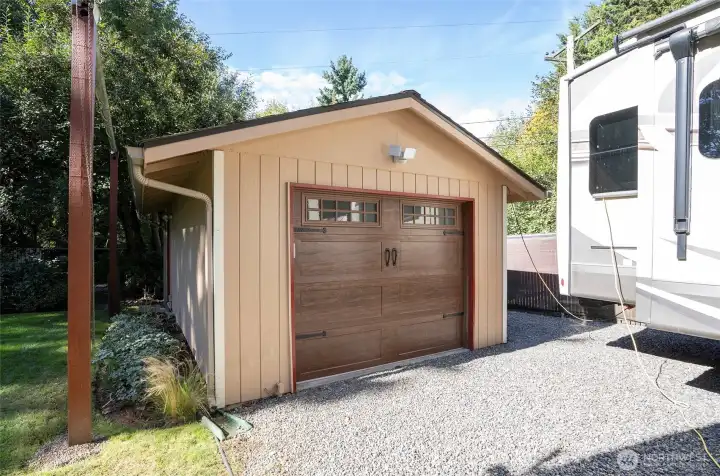 Detached garage with plenty of space and functionality.