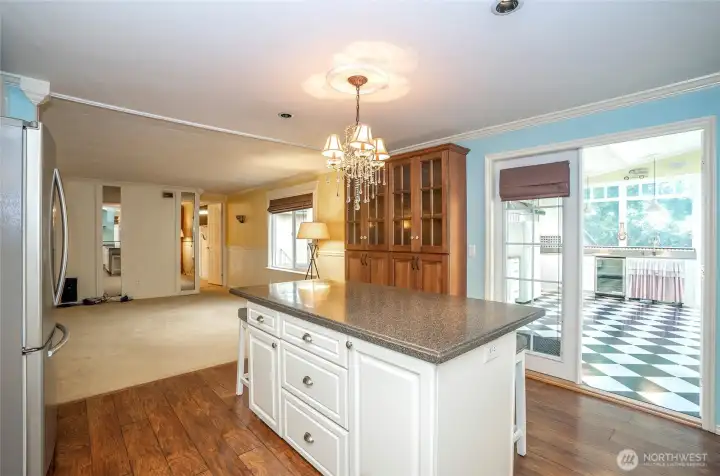 Kitchen island with extra storage and direct access to your dream entertaining area!