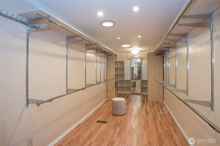 Expansive walk-in closet with extra cabinetry at each end—perfect for organizing all your belongings!