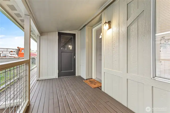 Large covered front porch w/wrap to back porch. Nice attached storage shed through black door